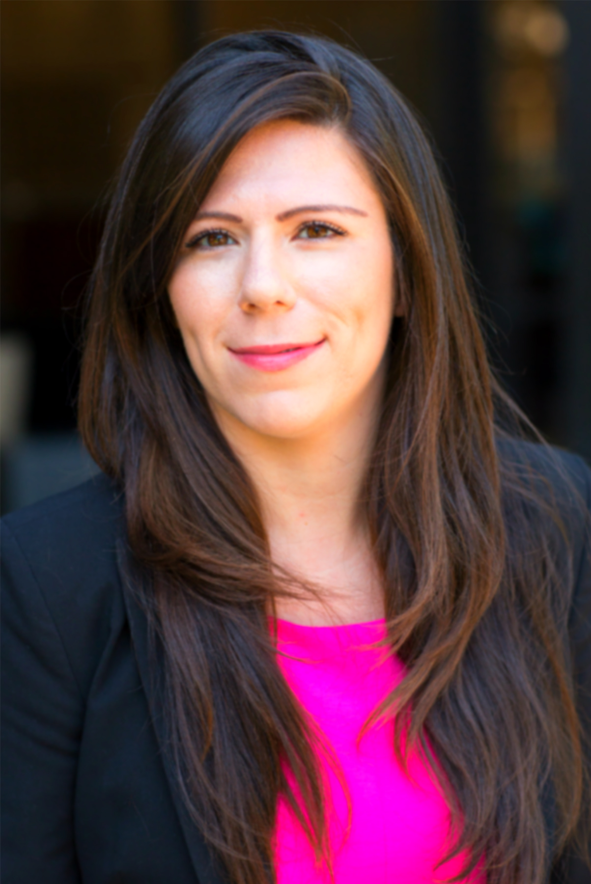 Smiling woman in a suit