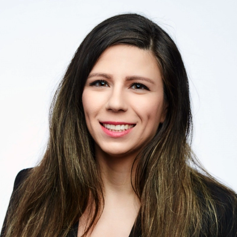 Smiling woman in a suit